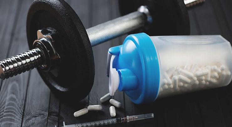 Barbell and steroids for bodybuilders developing gynecomastia.